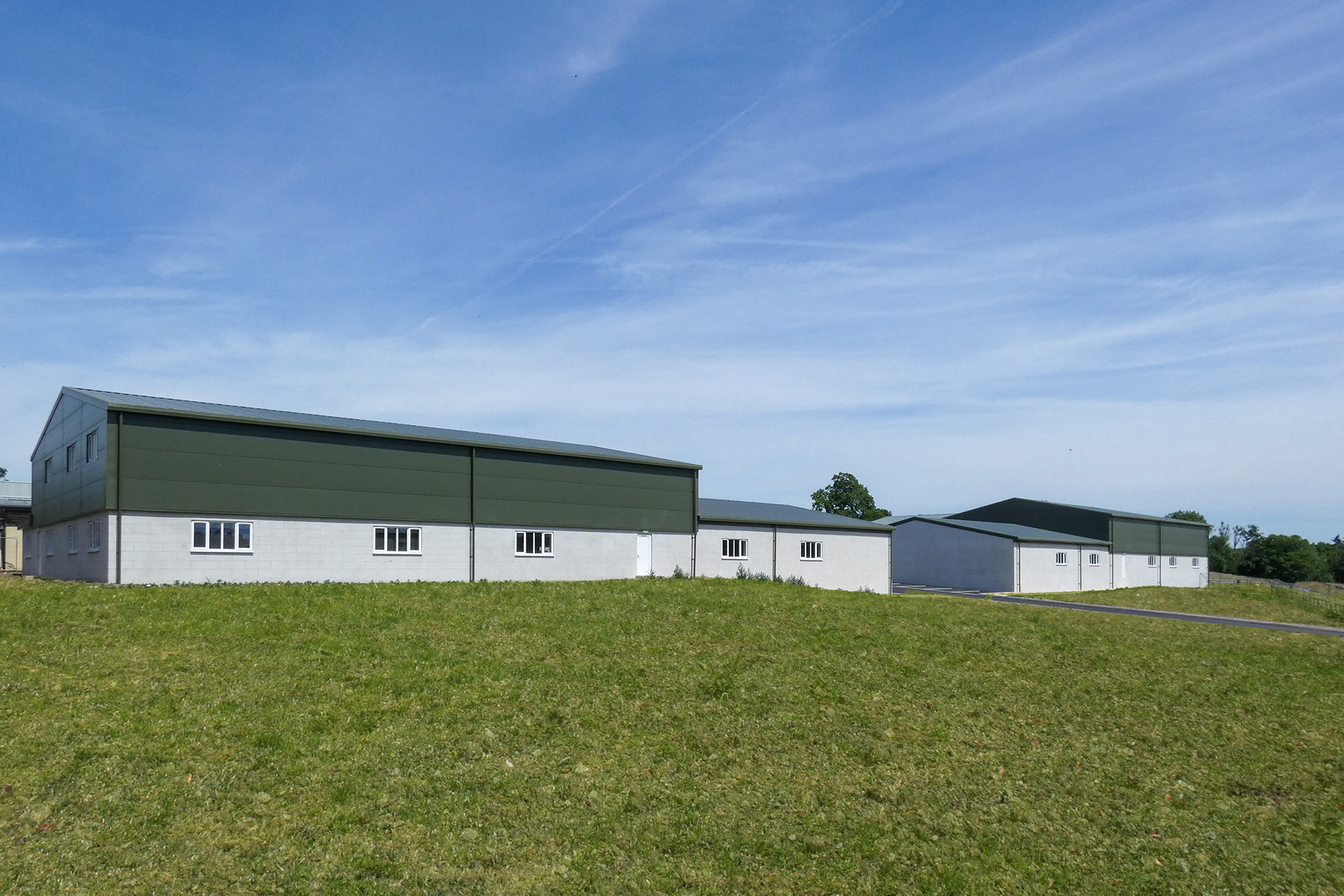 rear view of new industrial units with metal cladding and blockwork