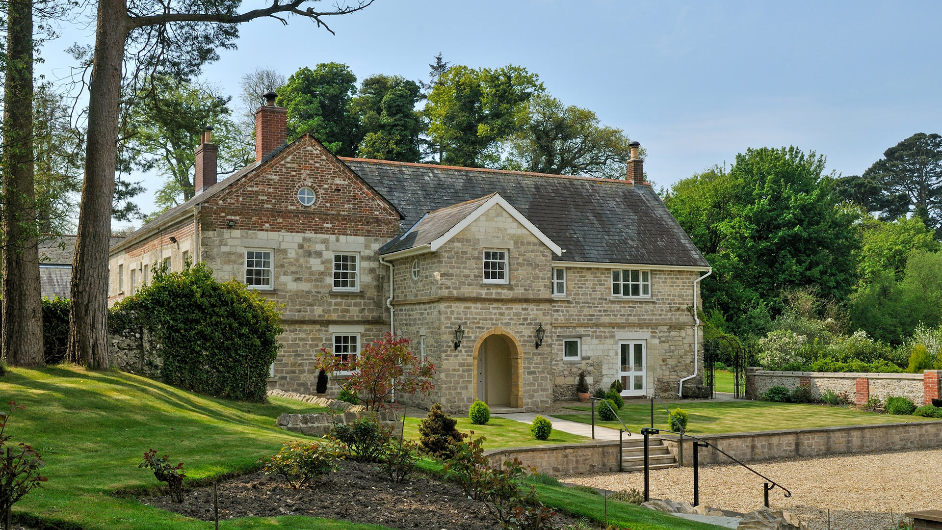 front view of a large stone heritage house
