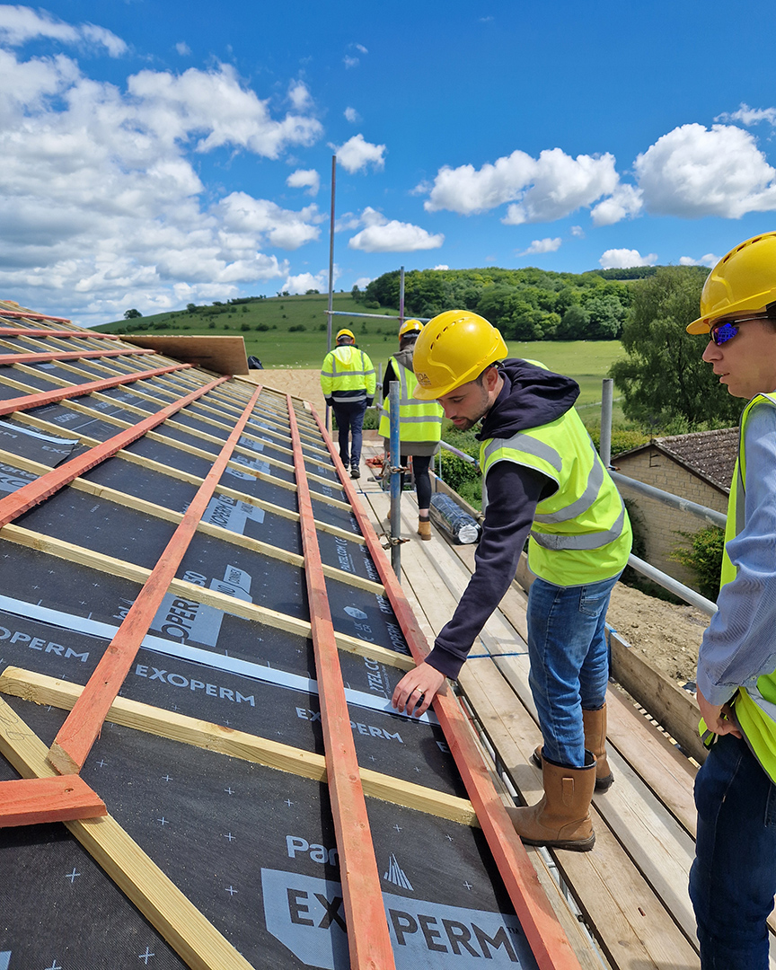 rooftop under construction with country views in distance