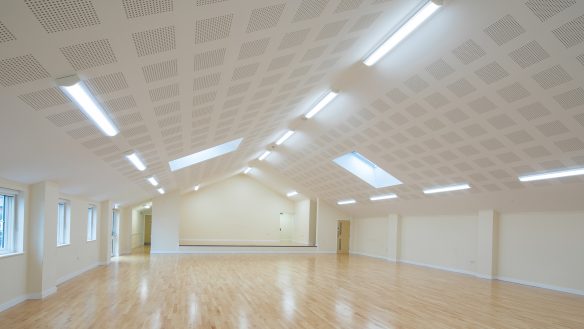 interior of large village hall open space with stage