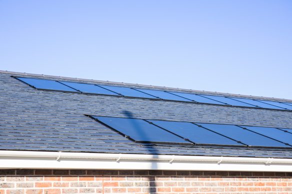 solar panels on roof with slate panels