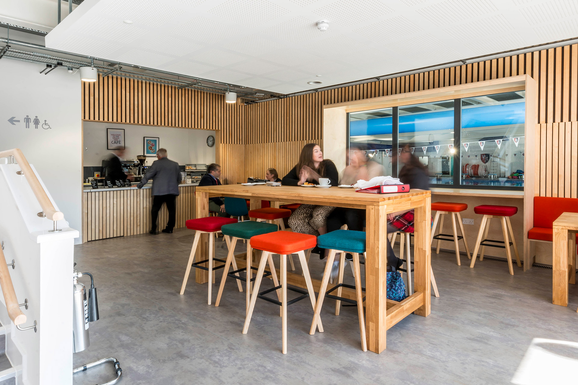 school café with serving hatch and internal window to see swimming pool