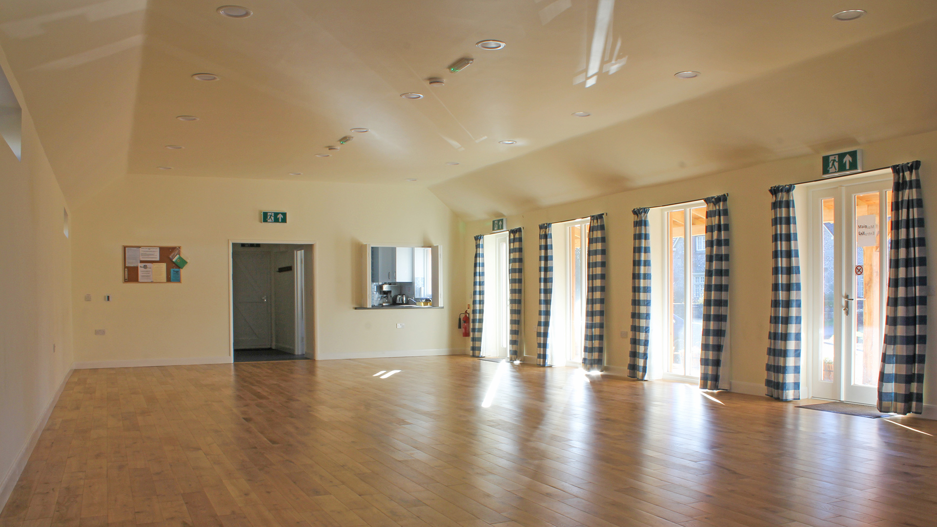 village hall interior with hatch to kitchen area