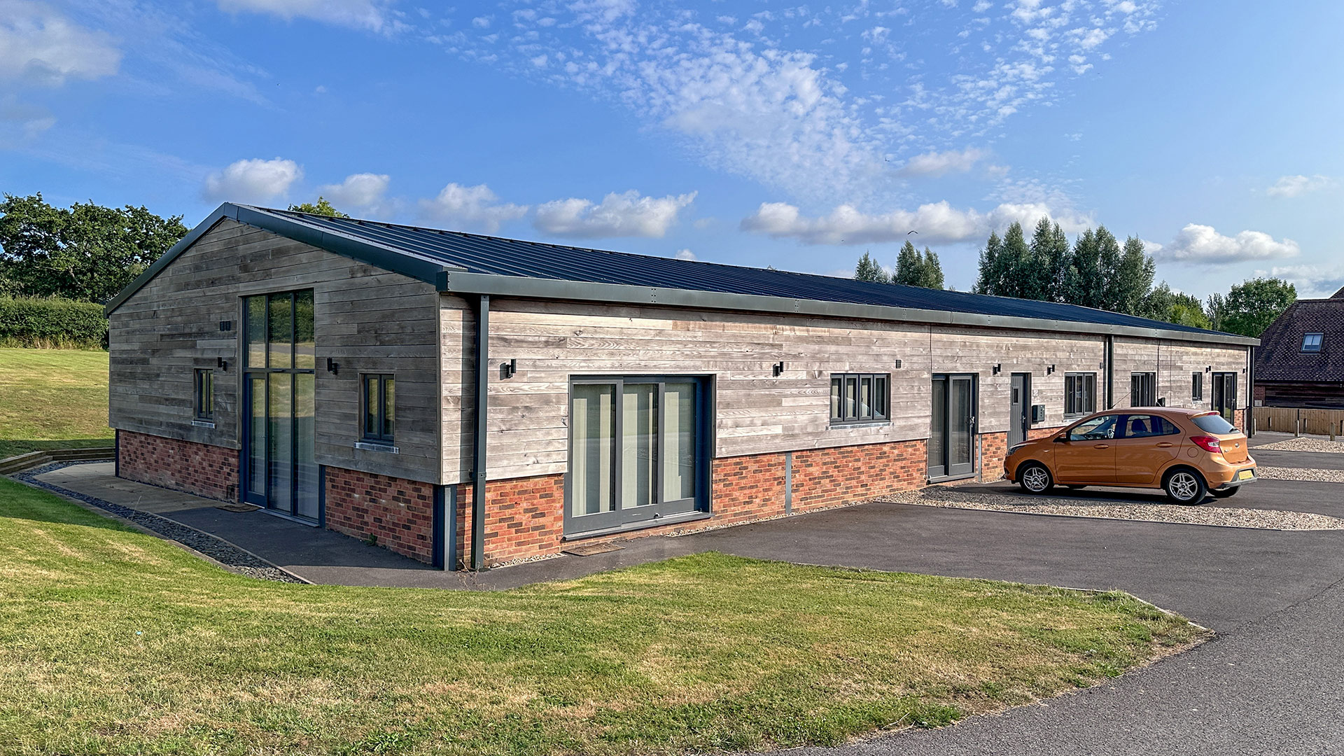 after photo of converted barn to class q housing