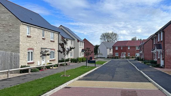 housing development with a mix of stone and red brick housing