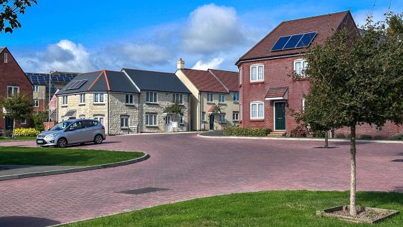 housing development with solar panels on roof