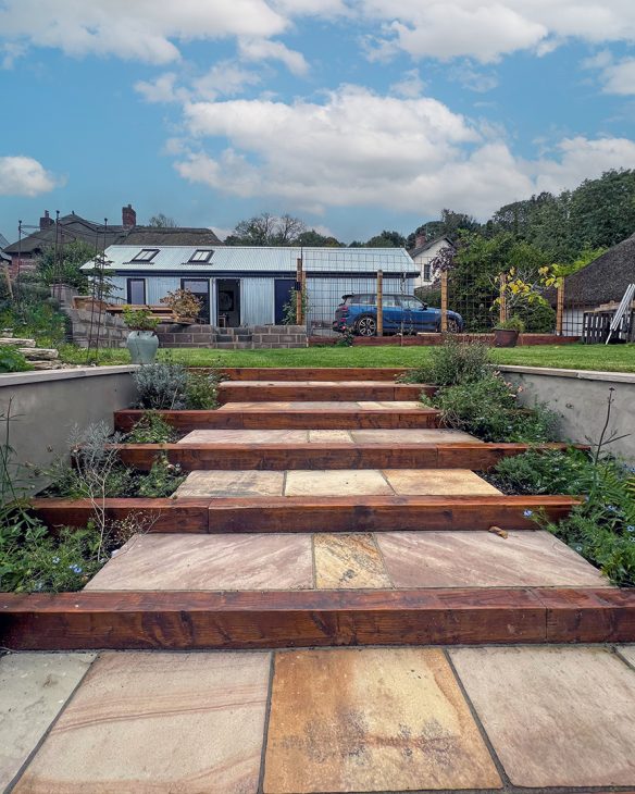 modern corrugated annex in garden