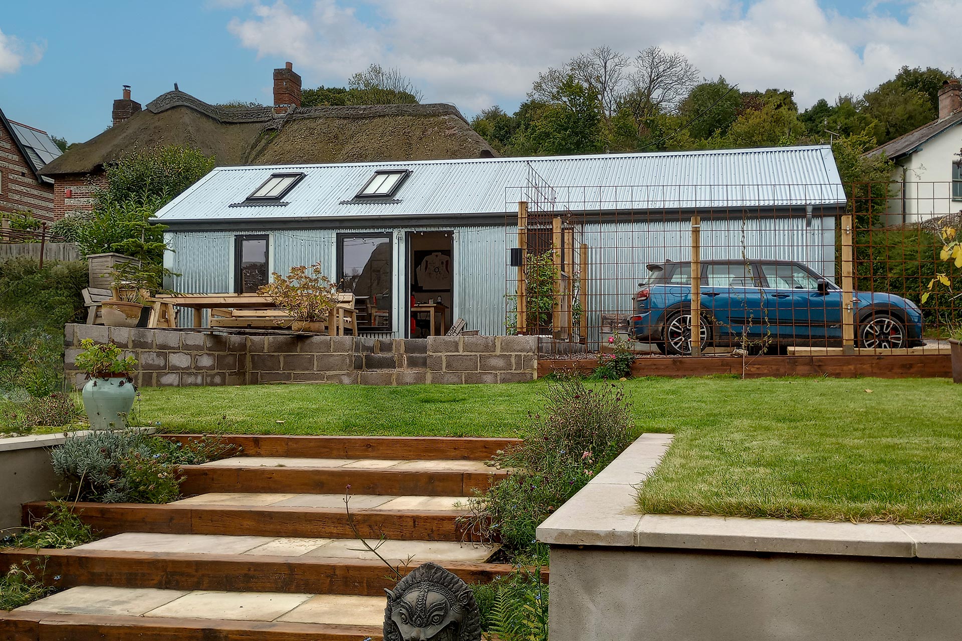 modern corrugated annex in garden