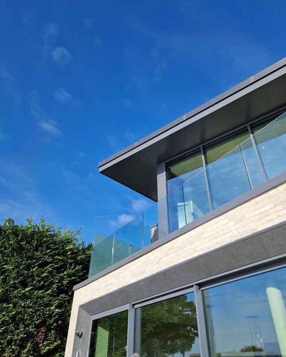 detail view of balcony and roof overhang