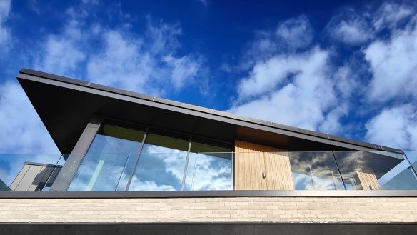 detail view of balcony and roof overhang