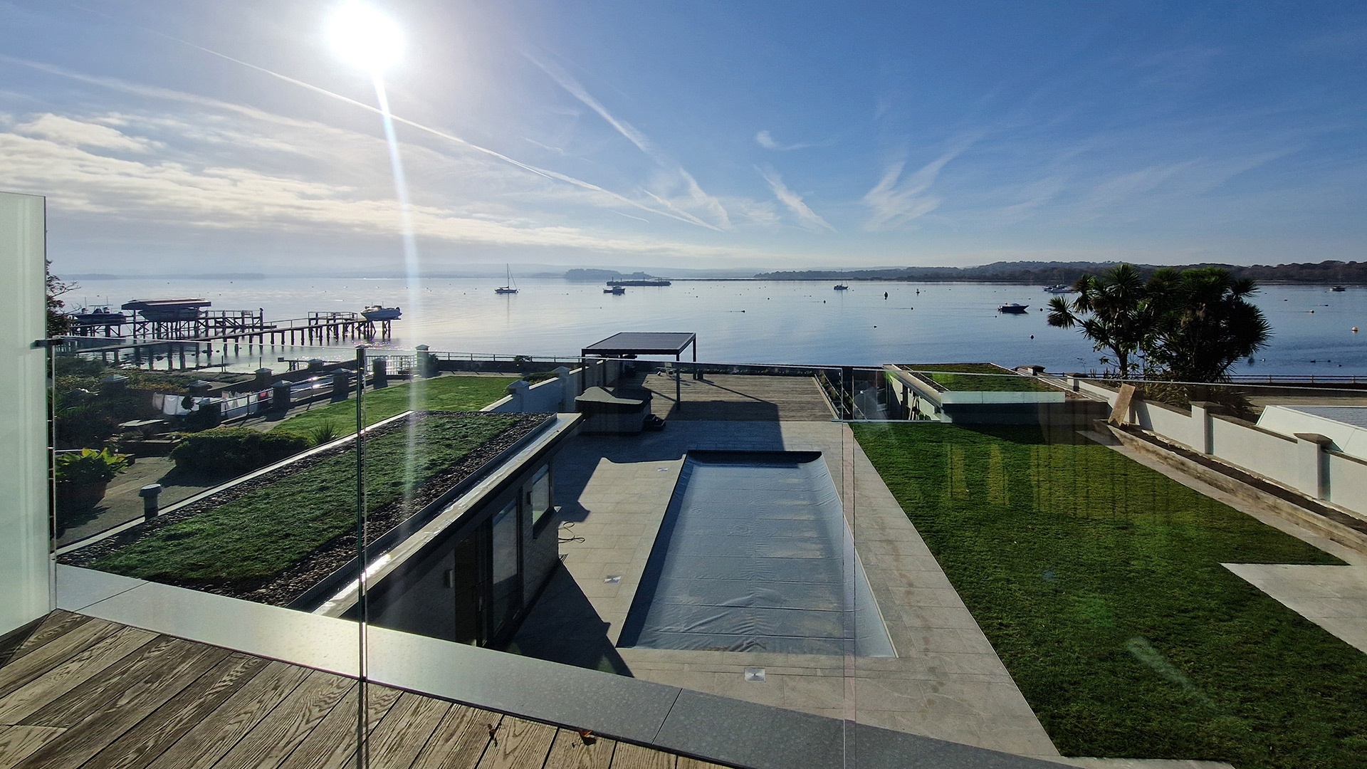 stunning sea view from first floor balcony with glass balustrade